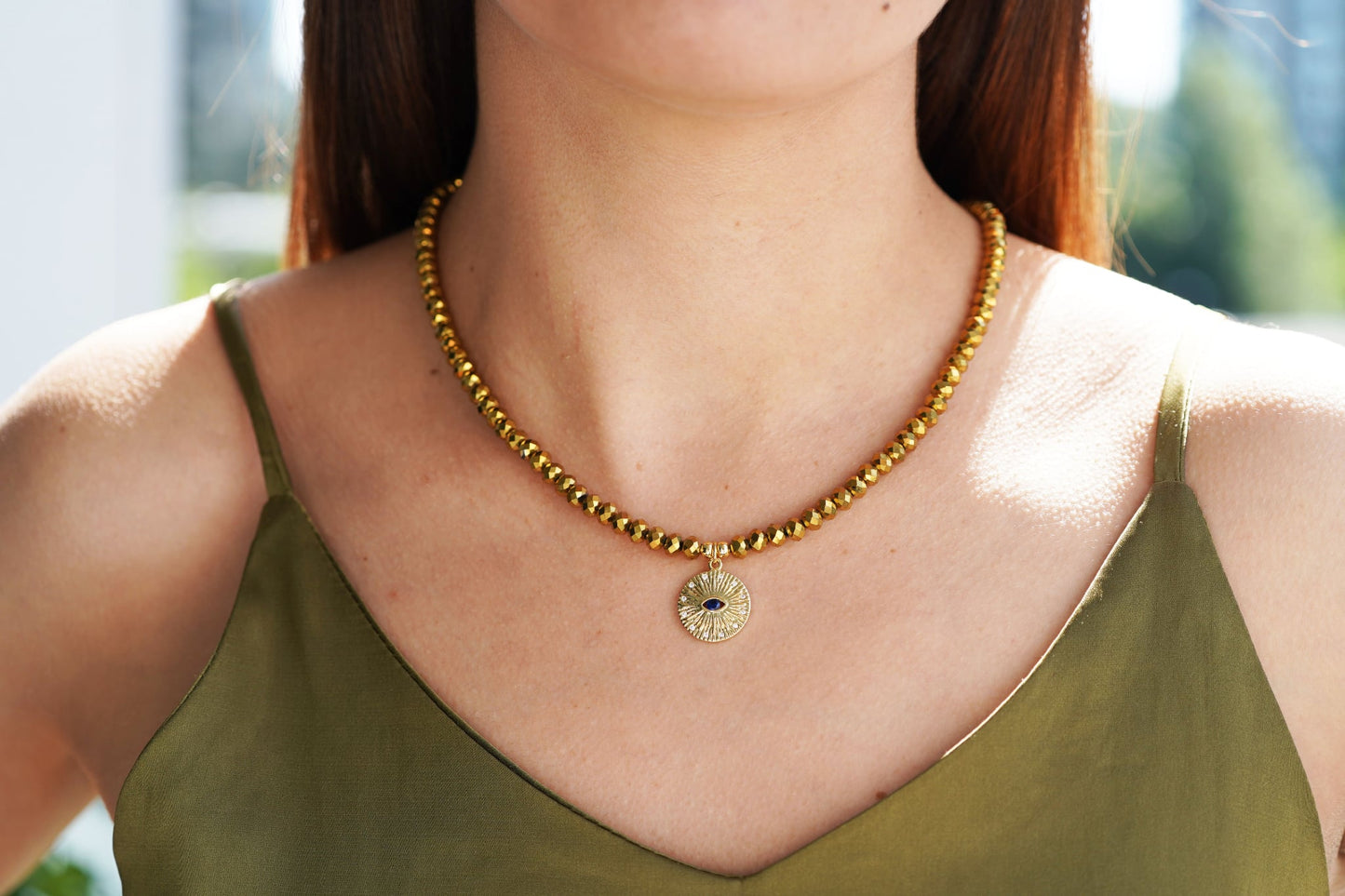 Gold Crystal Necklace with Evil Eye Pendant