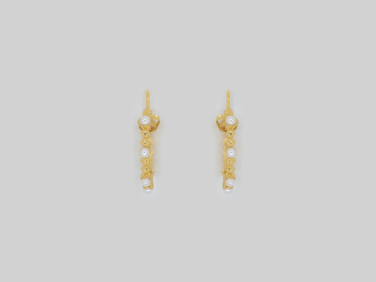 Hoop earrings made in Gold Plated 18k with natural pearls. Gold plated earrings by Xatli. Gold plated earrings Canada. Earrings with pearls.  Affordable jewelry for every occasion.