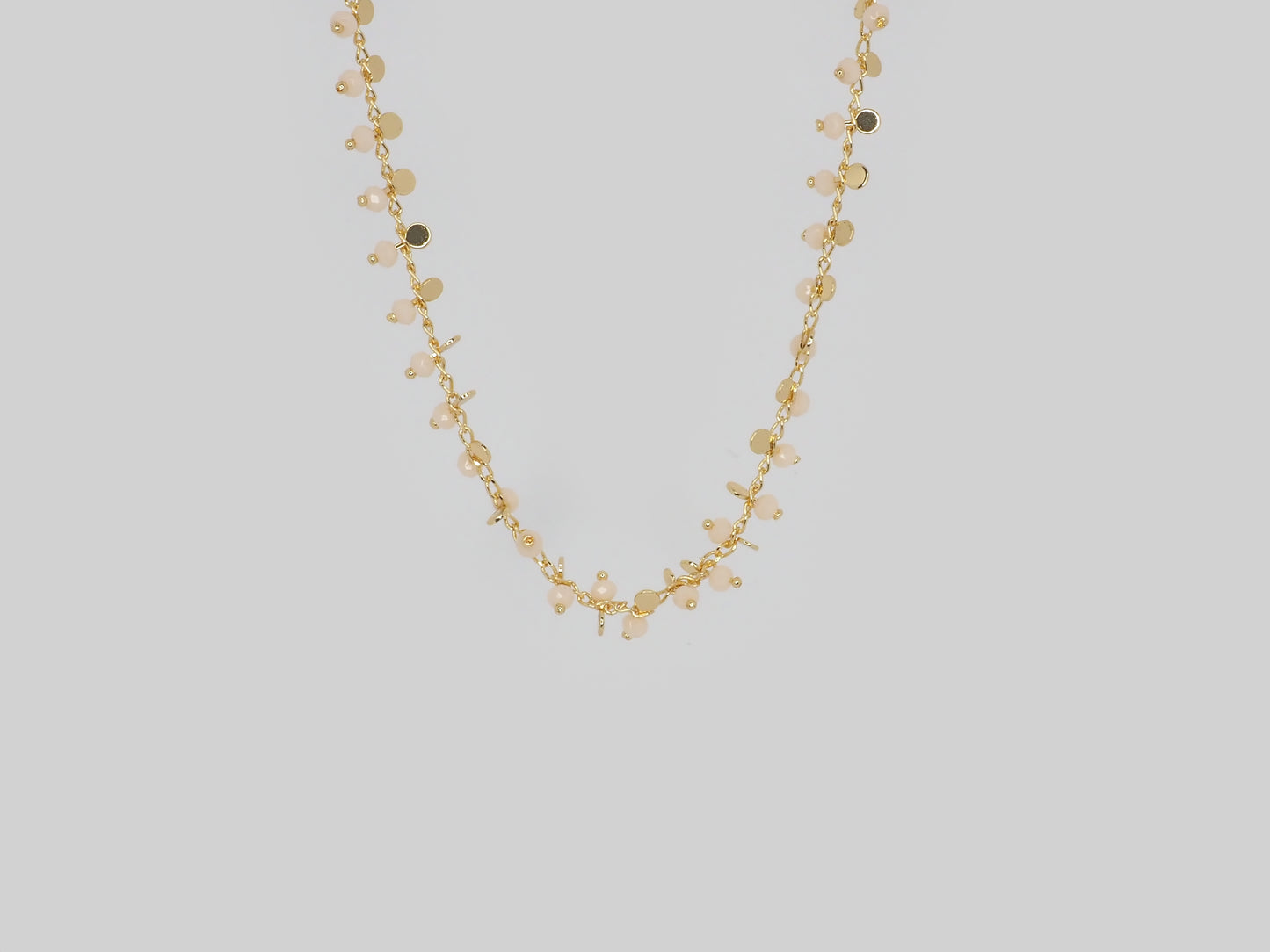 Small stones and  small coins like elements. Made Gold Plated 18k. Beautiful handmade necklace. Gold plated chain necklace by Xatli. Gold plated necklace Canada. 18k gold plated chain. Affordable jewelry for every occasion.