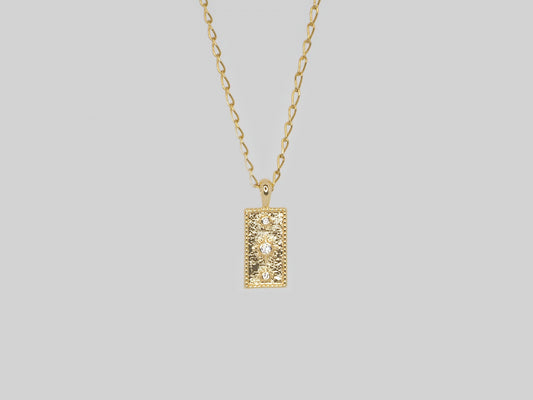 Rectangle pendant with evil eye in gold plated with zircons. Chain Made Gold Plated 18k Golf plated necklace with zircons. Beautiful handmade necklace. Gold plated necklace by Xatli. Gold plated necklace Canada. 18k gold plated chain. Affordable jewelry for every occasion.