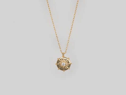 Sun Round Pendant Gold Plated 18k Necklace with Zircon at center. Beautiful handmade necklace. Gold plated chain necklace with sun pendant in gold with zircon by Xatli. Gold plated necklace Canada. 18k gold plated chain. Affordable jewelry for every occasion.