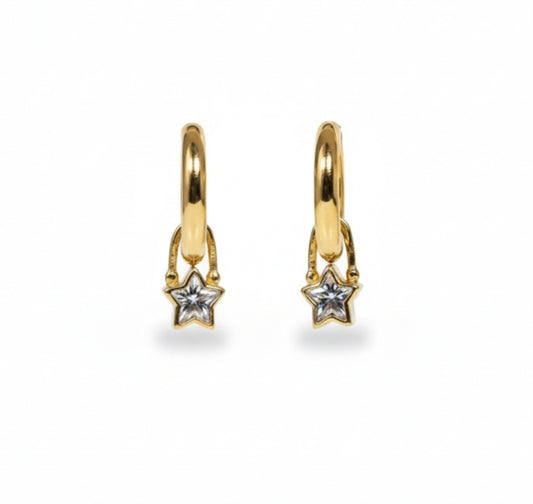 18k Gold Plated Mini Star Huggies holding